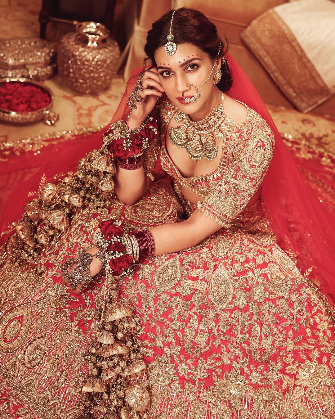 Kriti Sanon In A Gorgeous Red Bridal Lehenga In Manish Malhotra Outfit Moviekoop
